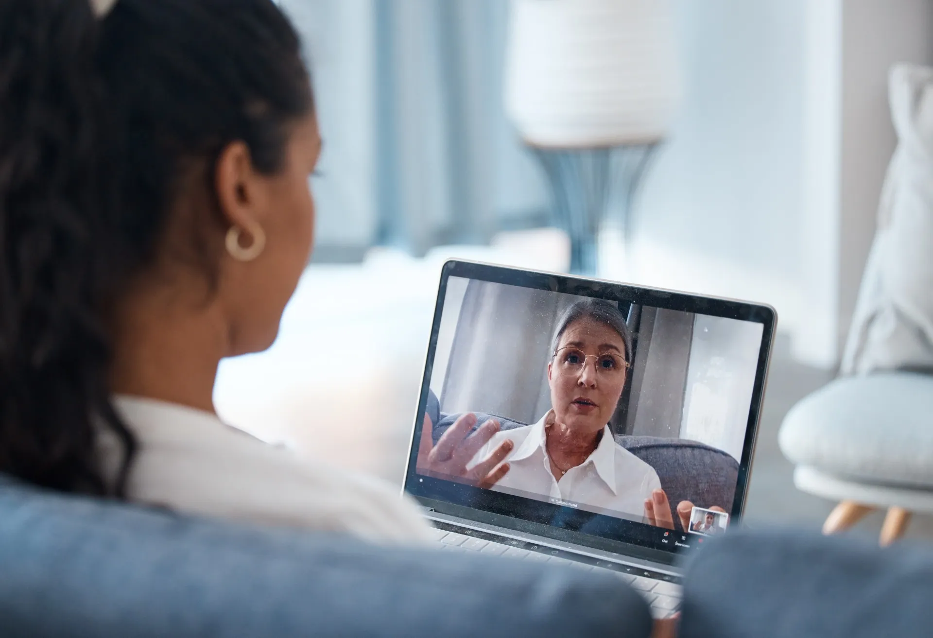 Woman receives advice during virtual meeting